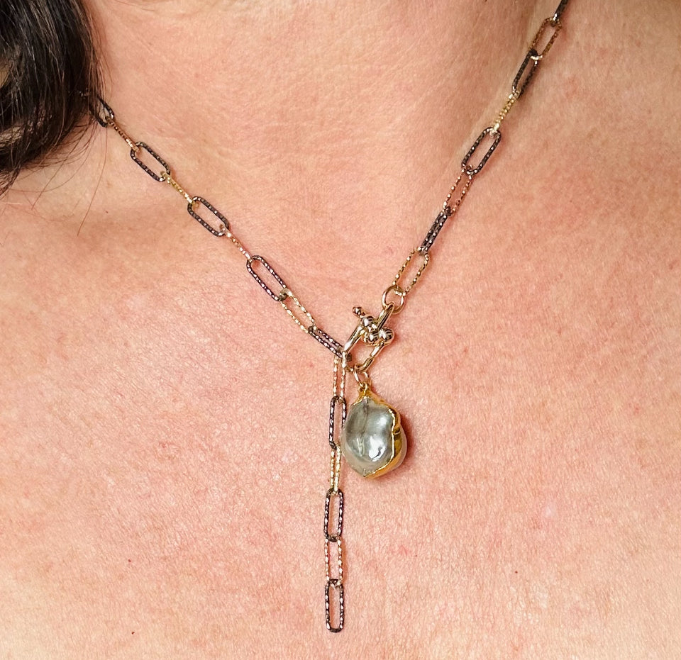 mixed -metal- paper- clip -chain -necklace- on- model -with- a -pearl hanging- off -the -clasp-belaroca-jewelry
